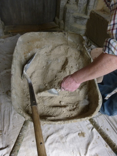 Adding goat hair to plaster for the porch at Little Snoring