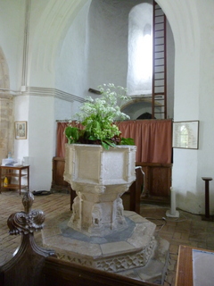 Mutford font and tower arch