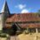 Colour photographs of one of three Sussex round tower churches